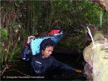 man-carring-boat An OFI ranger