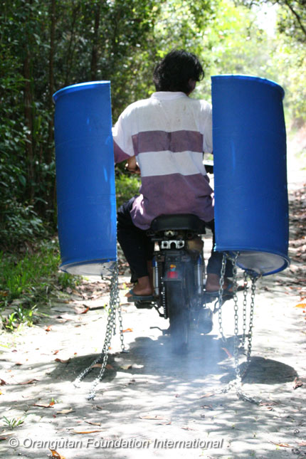 Mr. Uzhi transporting swings to the Quarantine block